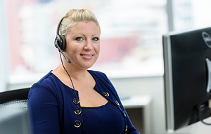 SA Water customer care centre team member using wireless headset at desk